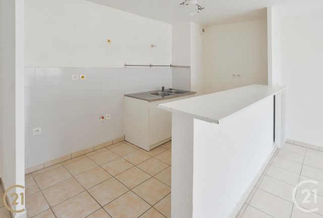 Afficher la photo en grand Appartement F3 à vendre - 3 pièces - 59.45 m2 - VIGNEUX SUR SEINE - 91 - ILE-DE-FRANCE - Century 21 Optimmo